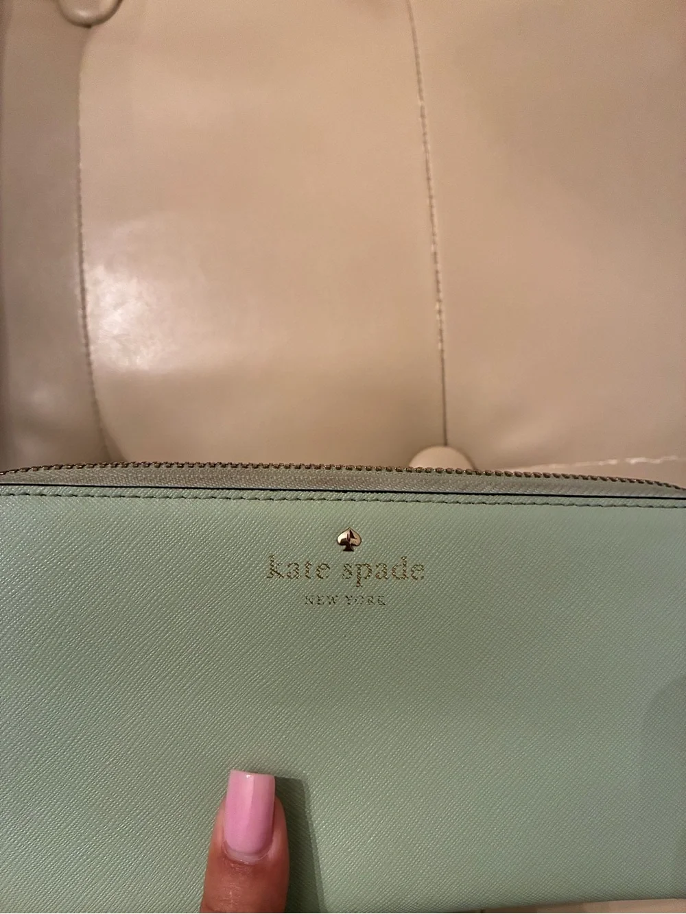 kate spade mint green zip-around leather wallet with gold logo
